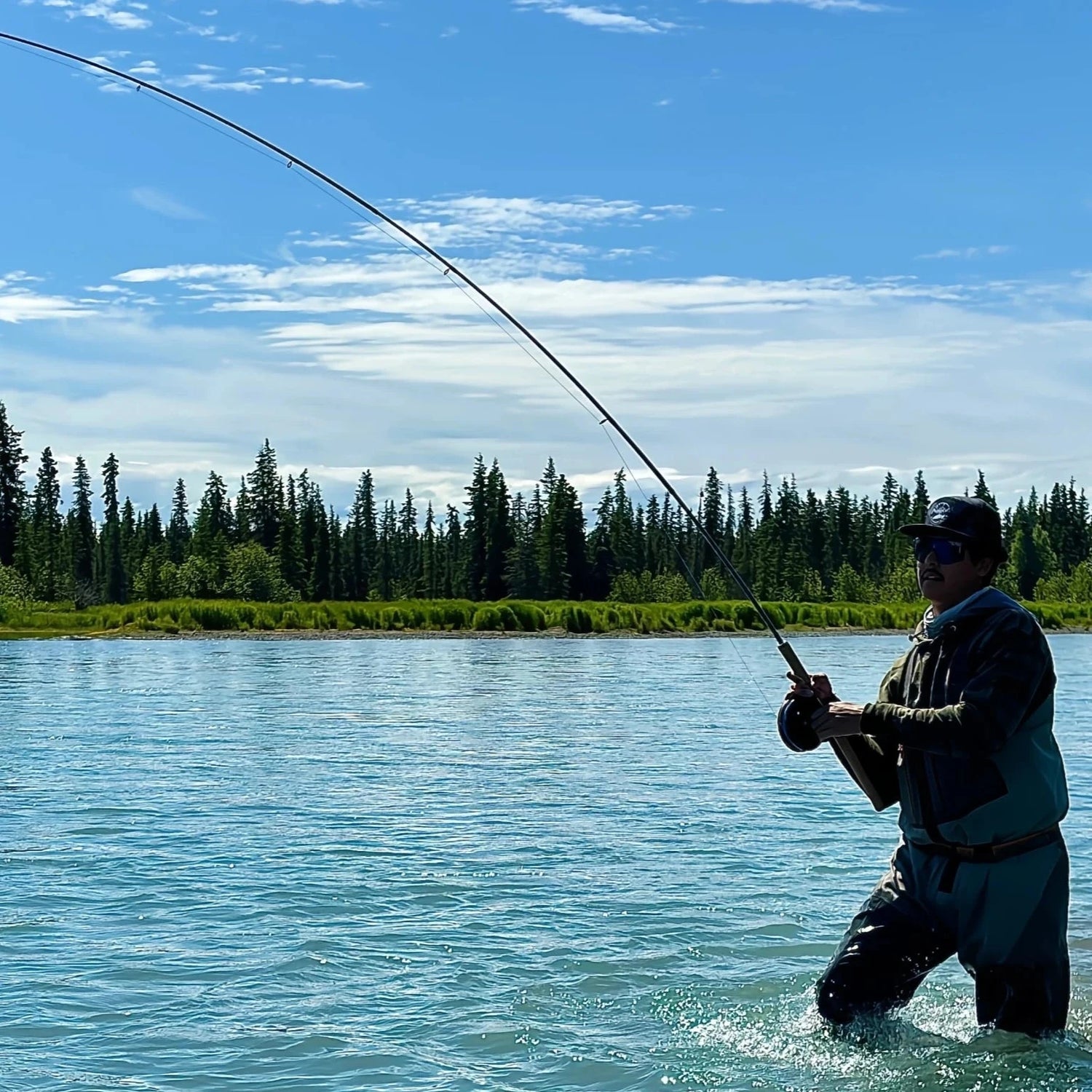 Blood Run Skein Cane Centerpin Rod fishing for chinook king salmon on the Kasilof river on the Kenai peninsula in Alaska.