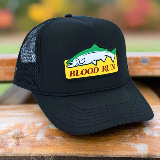 Black trucker cap with 'Blood Run' logo on a white background