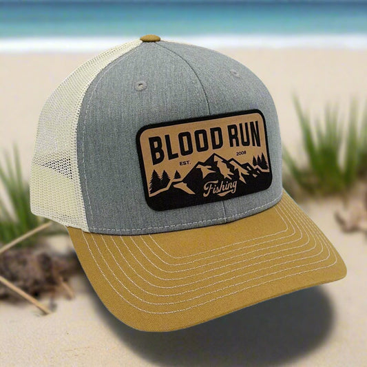 Mens two tone richardson hat with grey heather crown and gold brim with Blood Run Fishing Leather Patch