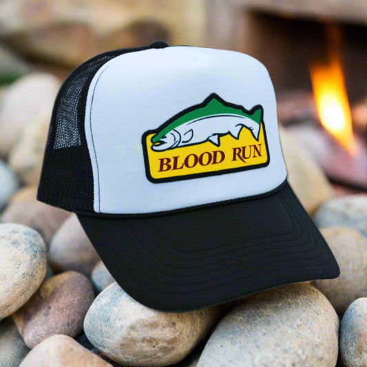 Unisex black and white Bass Pro Foam Trucker hat with Blood Run Logo on crown snapback.