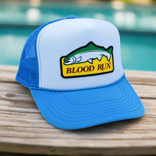 Blue and white cap with 'Blood Run' logo on a white background